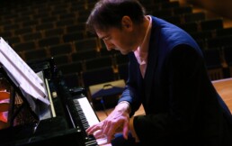 Alistair McGowan plays the piano